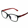 A pair of black computer reading glasses with red frames shown against a white background.