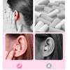Image showing memory foam earplugs being inserted into an ear and a pile of the same earplugs.
