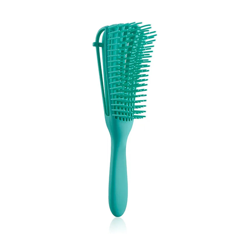 Peigne en plastique bleu sarcelle à dents fines pour le massage du cuir chevelu et le démêlage.