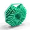 A green silicone exfoliating shower scrub brush with a textured, fan-like head.