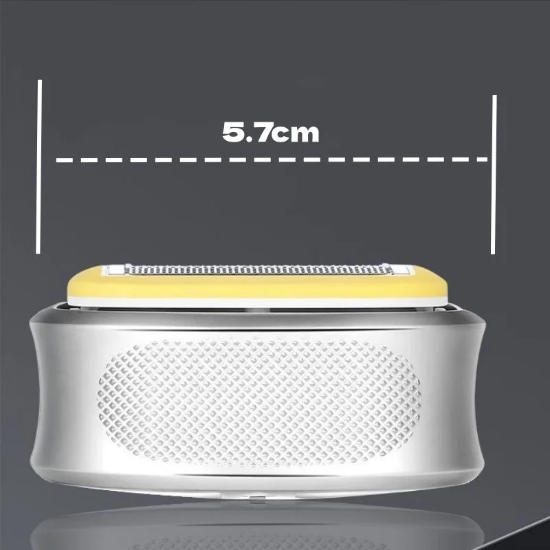 Silver precision manual safety razor with a yellow shaving head, showing its size.
