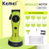 A lime green Kemei brushless motor hair clipper with accessories displayed on a light green surface.