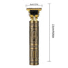 A professional cordless electric hair clipper with a gold-toned body and blade assembly.