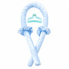 A light blue satin heatless curling set with a curved barrel and decorative fabric ties.
