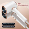 A white professional hair dryer with a rose gold accent, showing multiple nozzles and features for smooth drying.