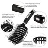Black curved vented hair brush with silicone handle, round head massage features, and a bottom hole for storage.