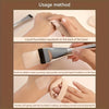 Demonstration of using a liquid foundation squeezed on the back of the hand and applying it with a brush for makeup applicati