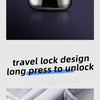A silver electric shaver with a travel lock design is shown inside a zippered case.