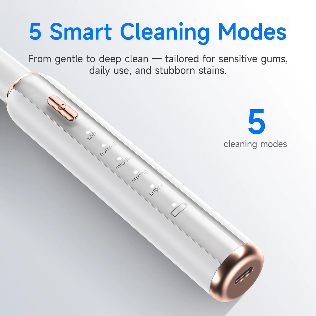 A close-up view of a sleek, silver ultrasonic tooth cleaner device with various cleaning mode settings visible.