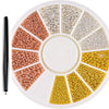 A circular tray of gold mixed stainless steel bead nail art decorations in various shades and sizes.