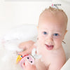 A baby is playing in water with a pink toy while being shown as IPX7 waterproof.