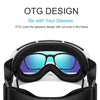 Black ski goggles with cutouts in the frame shown on a black strap