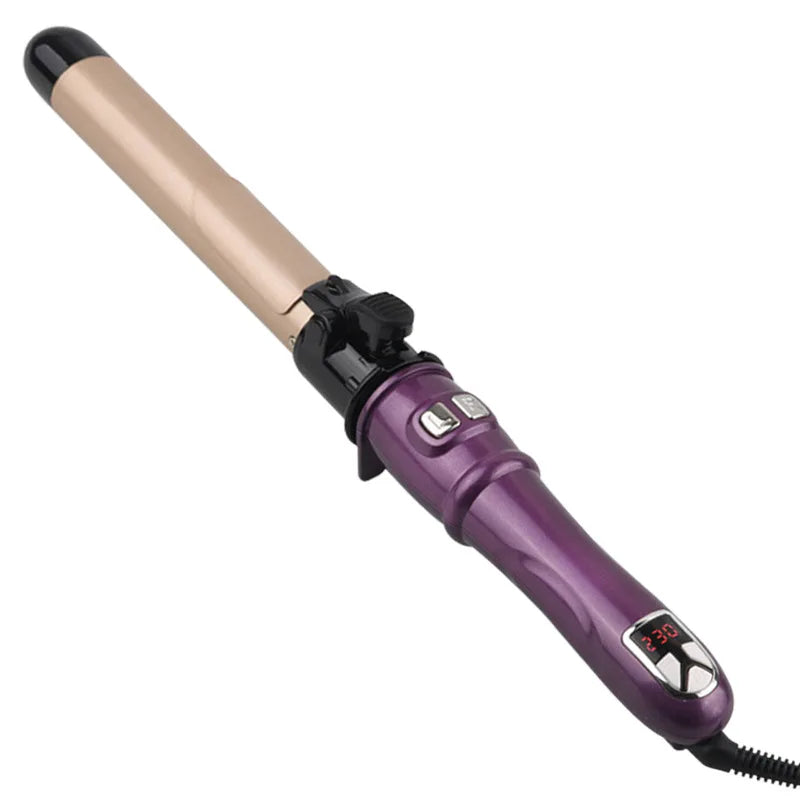 A close-up view of an automatic rotating curling iron with a gold barrel and purple handle.