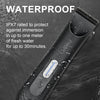 A close-up of a waterproof grooming trimmer with water droplets on its surface.