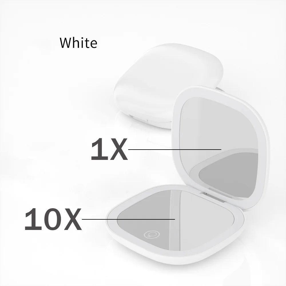 A white compact LED makeup mirror showing 1X and 10X magnification settings.
