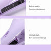 Close-up view of a purple electric curling iron with a built-in switch and an intimate lock feature.