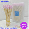 A pack of 400 pink single-point wooden cotton swabs stored in a clear plastic container.