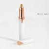 A white electric eyebrow trimmer and epilator with a gold tip is shown standing upright and lying down.
