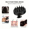 A black multi-functional brush used for removing dandruff, relaxing scalp massage, promoting blood circulation, and helping h