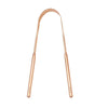 A stainless steel U-shaped tongue scraper with a rose gold finish.