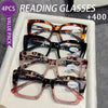 A white box containing four pairs of tortoiseshell reading glasses for presbyopia.