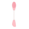 Cepillo facial de silicona rosa para limpieza y mascarilla con cabeza redondeada y mango largo.