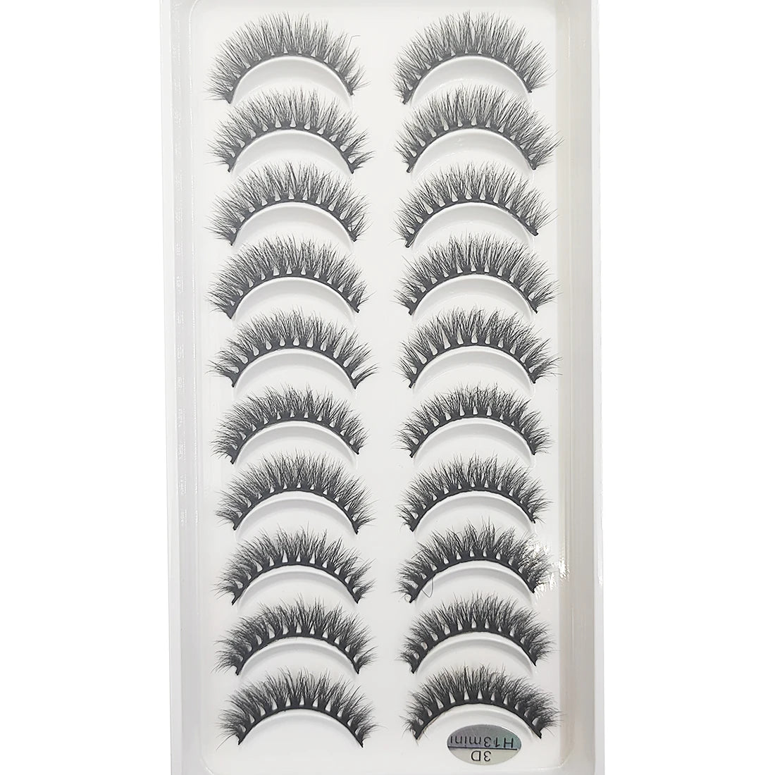 A plastic tray containing multiple pairs of natural 3D mink false eyelashes.