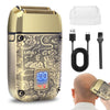 A gold-colored electric shaver with a textured body and a charging cable and brush shown next to it.