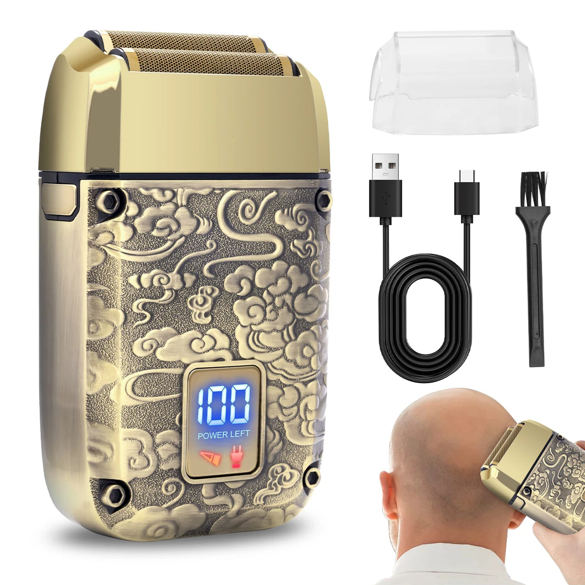 A gold-colored electric shaver with a textured body and a charging cable and brush shown next to it.