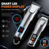 A silver cordless hair clipper set with a smart LED power display showing 100 percent and turbo mode.