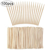 Un set de 100 bâtons de dépiquage naturels en bois pour sourcils et cheveux