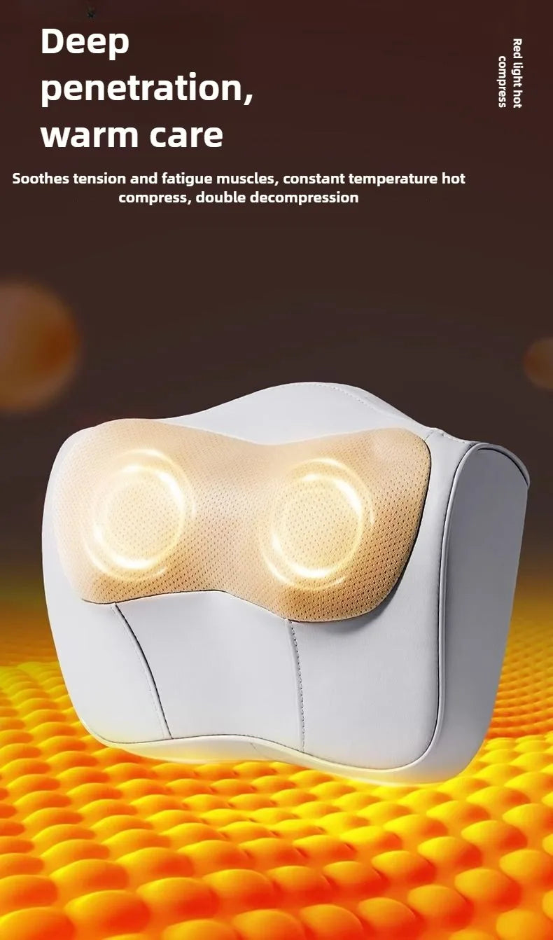 A white electric massage pillow with a warm light is shown resting on an orange textured surface.