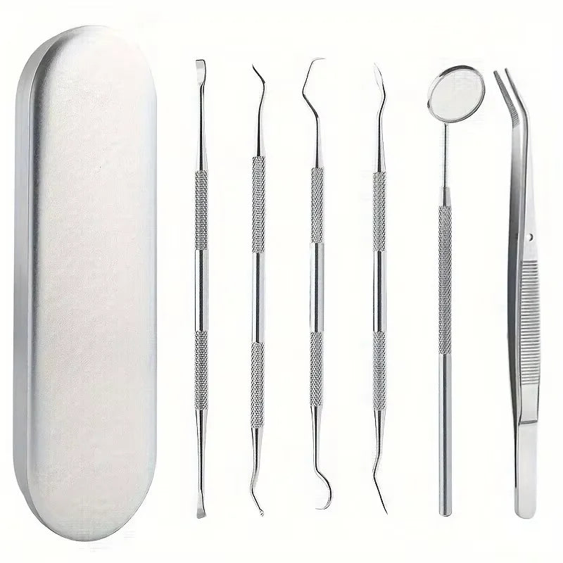 A set of stainless steel dental cleaning tools including probes and a mirror.