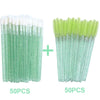 A set of 100 disposable eyelash and eyebrow brushes, including clear green and bright lime green varieties.