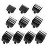 A set of replacement clipper guards numbered 1 through 8 in black plastic.
