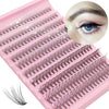 A pink lash tray with numerous synthetic cluster lashes arranged in rows, showing various lash styles.