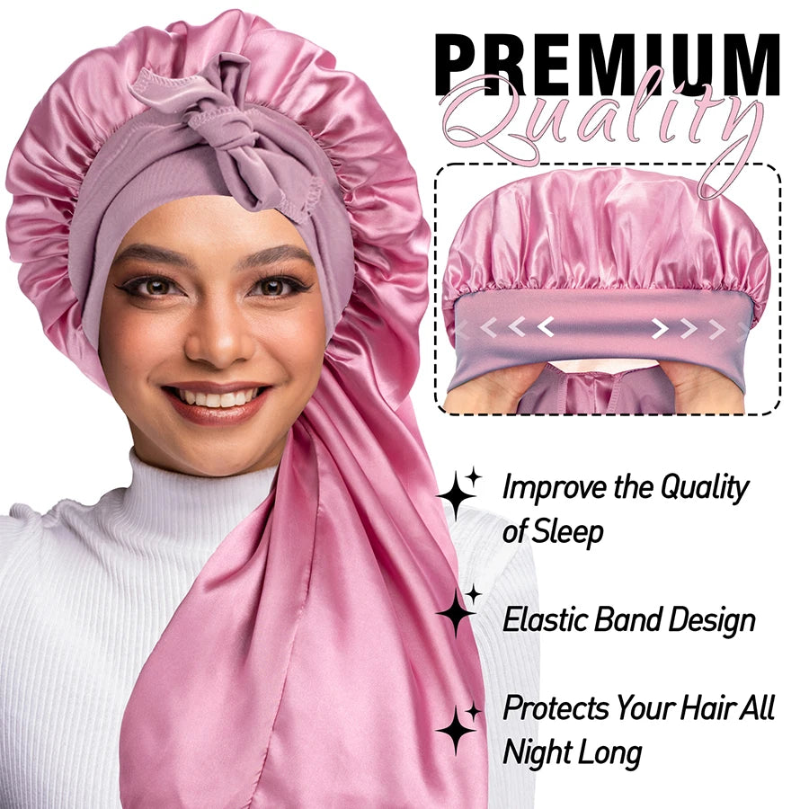 A woman models a pink satin silk hair bonnet cap, highlighting its elastic band design and protective features.
