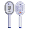 A white rechargeable electric spray hair brush with a light gray handle and bristles.