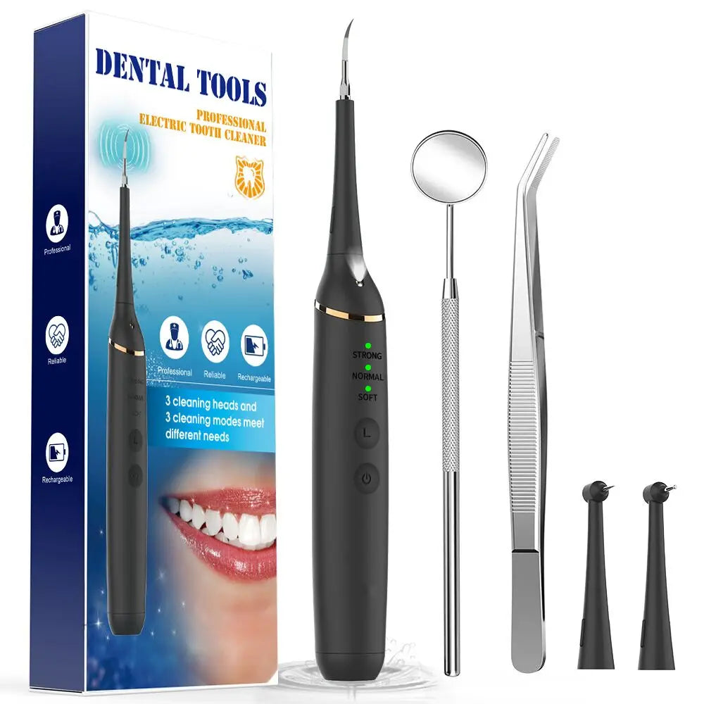 A black electric sonic dental scaler kit with a handle and a mirror is shown on a box.