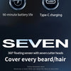 A close-up view of a silver magnetic rotary electric hair shaver with seven cutter heads.