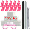 A set of pink reusable nail soak-off caps and tools for gentle gel polish removal, including silicone caps and metal tools.