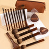 A collection of 14 professional makeup brushes and sponges in brown and tan tones displayed on a white surface.