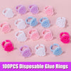 A collection of 100 disposable glue rings in various shades of pink and blue are displayed on a light pink background.