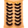 Un ensemble d'faux cils en fourrure de mink 3D dramatiques présentés dans un support en plastique.