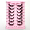 Un plateau en plastique rose contenant plusieurs paires de faux cils de renard dramatiques.