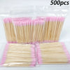 Un paquet de 500 cotons-tiges à double pointe en bois pour retirer le vernis à ongles, emballé dans du plastique transparent.