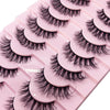 Un plateau rose de kits d'extensions de faux cils mink en 3D, disposés en rangées.