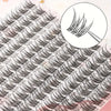 A close-up view of natural 12mm DIY tufted eyelash extensions showing various curl patterns and application techniques.