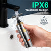 A hand is using an IPX6 washable design electric grooming trimmer to clean a faucet.
