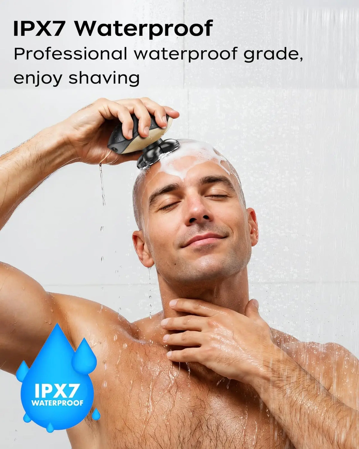 A man is shaving his head with a device while in the shower, demonstrating the IPX7 waterproof feature.